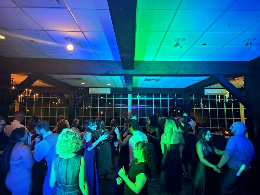 Dance floor lit in teal and blue